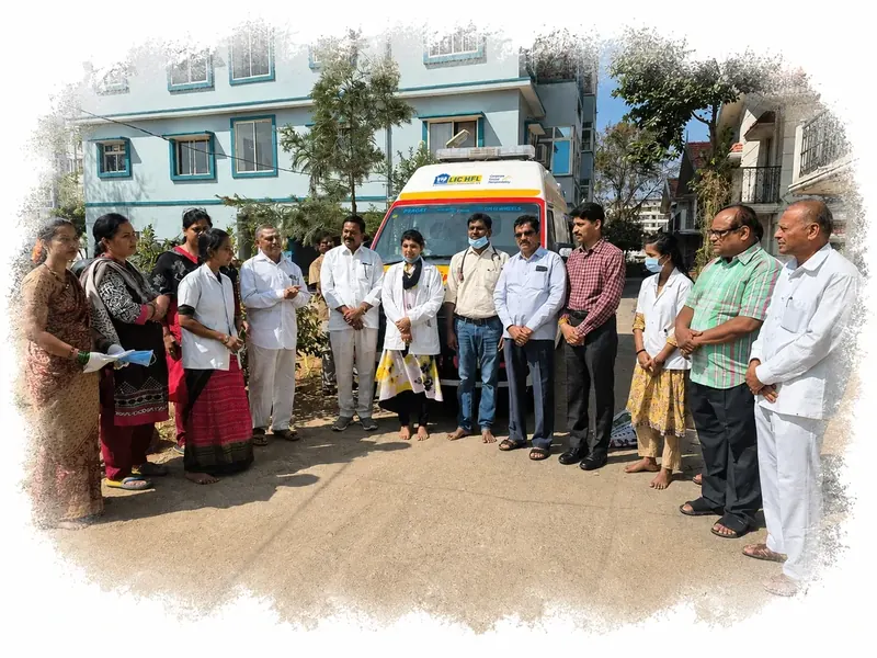 Community health volunteers running a medical camp in a rural Indian village.